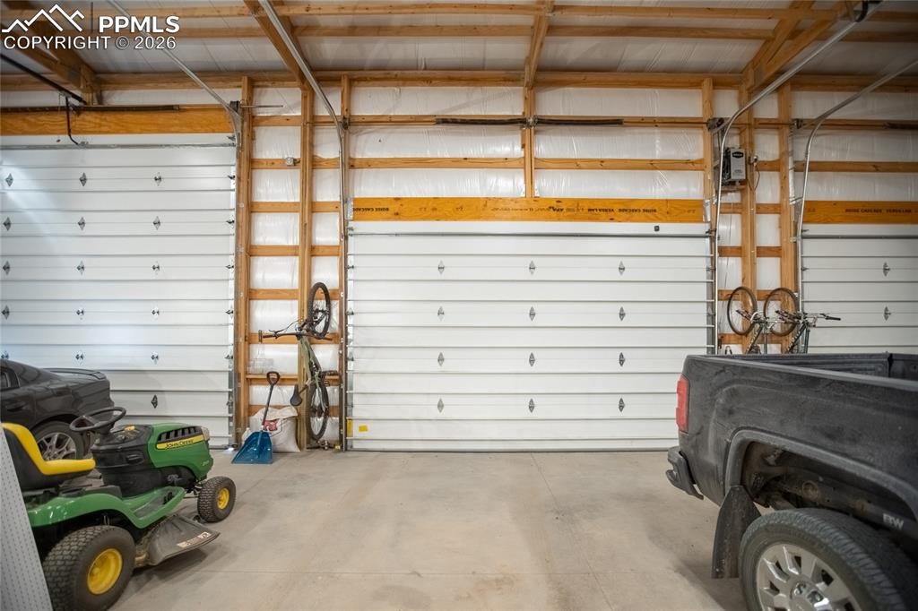24965 Cave Spg Trail Elbert, CO 80106 - Photo 32 of 50 a view of walk in closet with clothes and shoes
