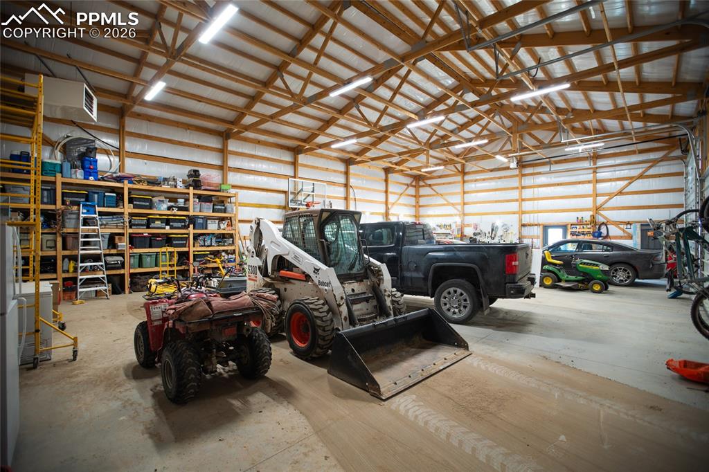 24965 Cave Spg Trail Elbert, CO 80106 - Photo 34 of 50 a view of car parked in garage