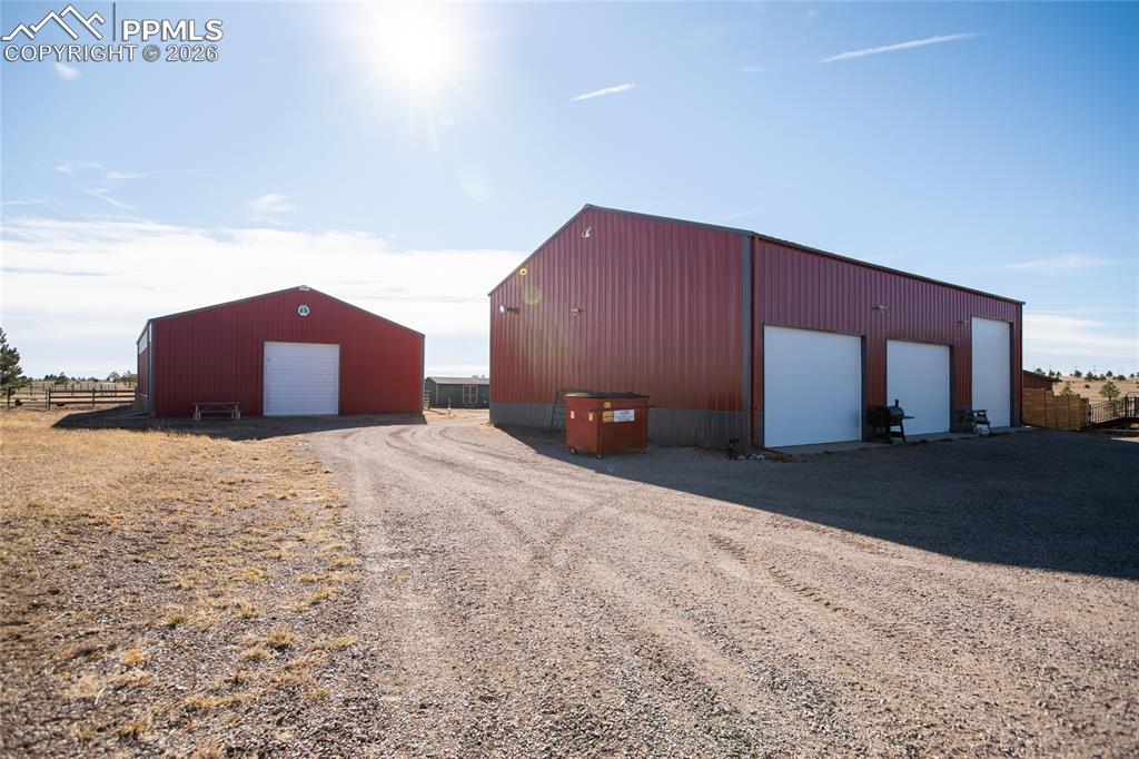 24965 Cave Spg Trail Elbert, CO 80106 - Photo 43 of 50 a view of a house with a snow in the yard