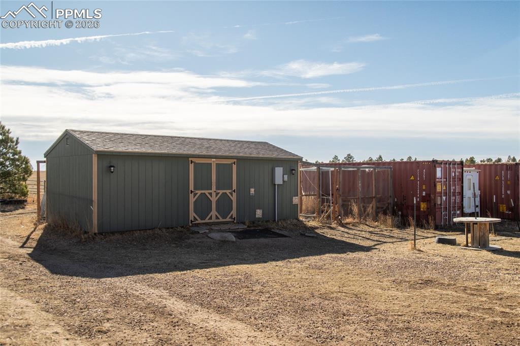 24965 Cave Spg Trail Elbert, CO 80106 - Photo 47 of 50 a view of a house with a yard