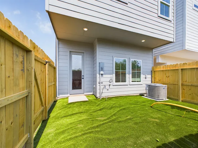 a kitchen with stainless steel appliances kitchen island a large counter top space appliances and cabinets