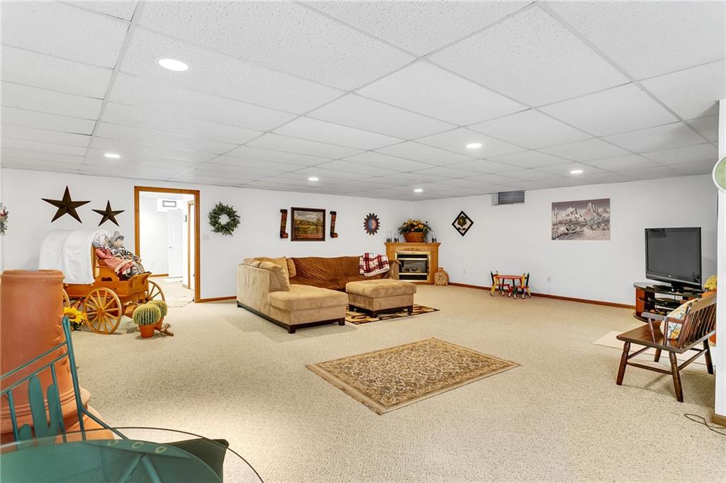 111 Francis Road Pittsburgh, PA 15239 - Photo 13 of 23 a bedroom with furniture and a wooden floor