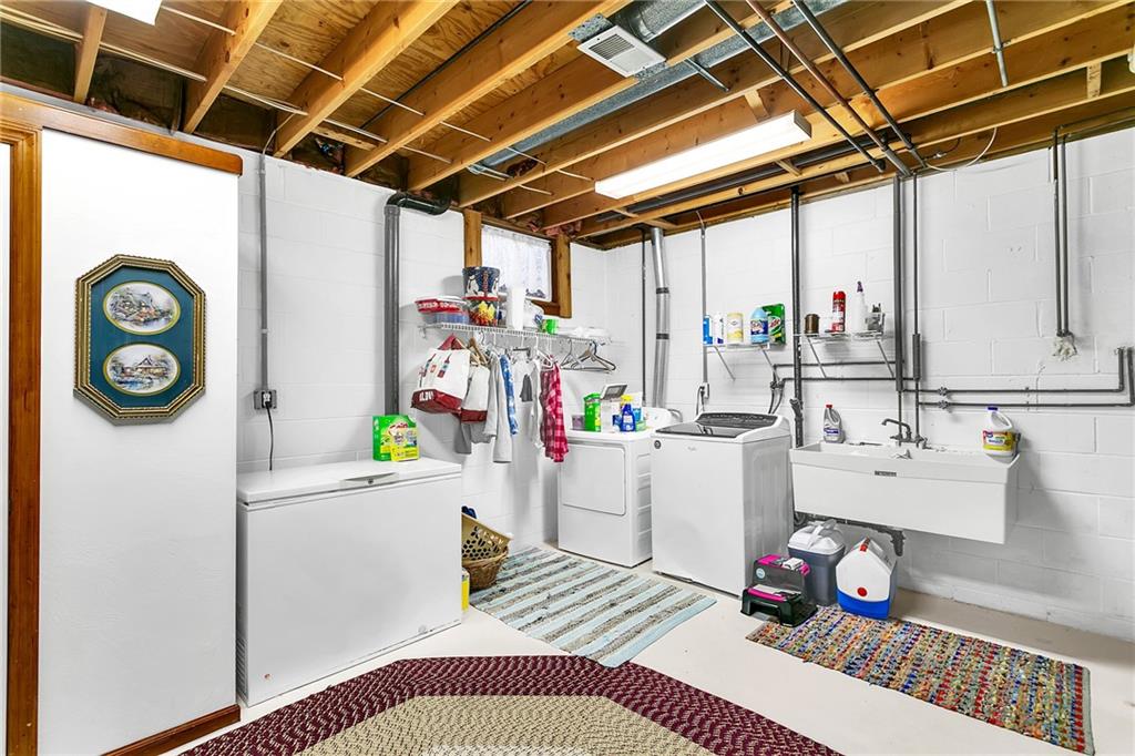 111 Francis Road Pittsburgh, PA 15239 - Photo 19 of 23 a utility room with dryer and washer
