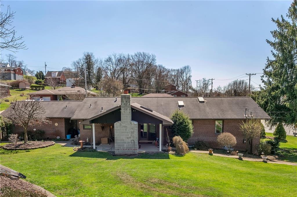 111 Francis Road Pittsburgh, PA 15239 - Photo 23 of 23 a view of a house with a yard and sitting area