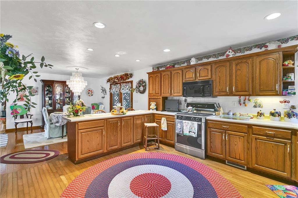 111 Francis Road Pittsburgh, PA 15239 - Photo 6 of 23 a kitchen with stainless steel appliances granite countertop a sink and cabinets