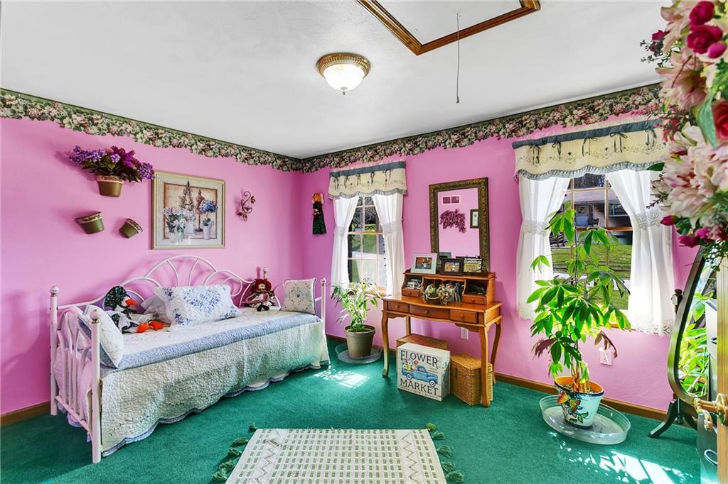 111 Francis Road Pittsburgh, PA 15239 - Photo 9 of 23 a bedroom with furniture and a baby crib
