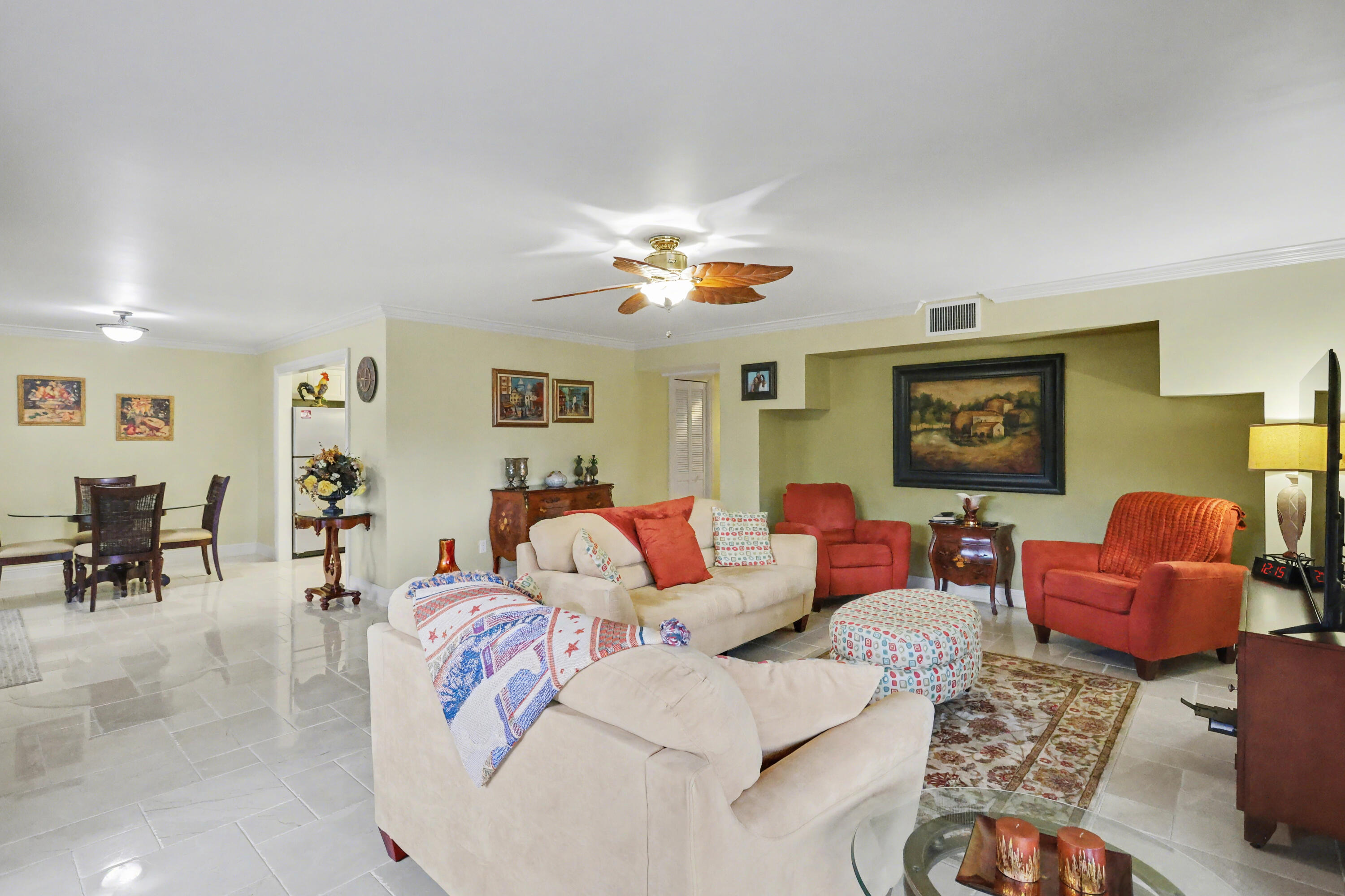 129 South Golfview Road, Unit 2 Lake Worth Beach, FL 33460 - Photo 13 of 35 a living room with furniture and white walls