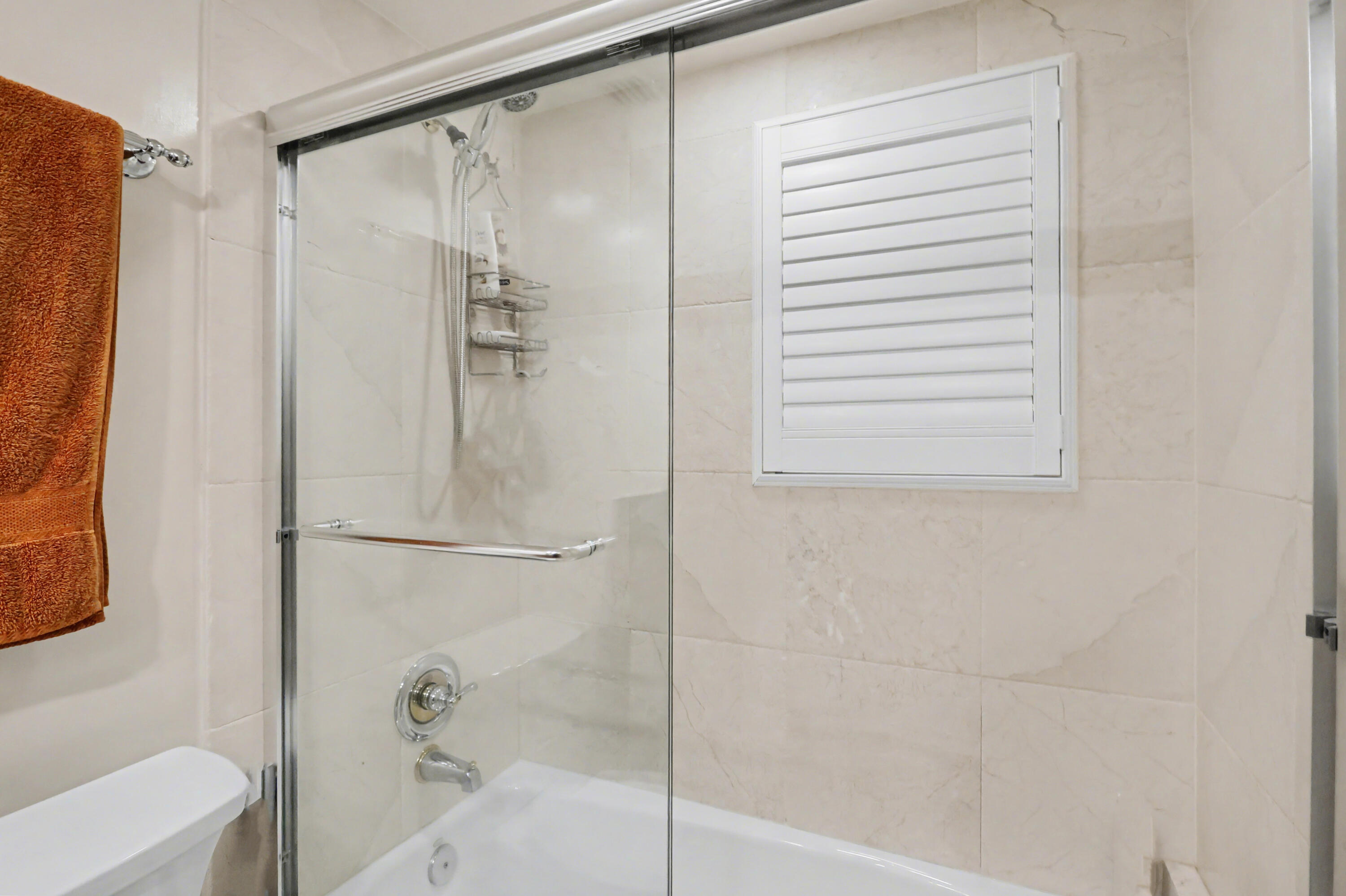 129 South Golfview Road, Unit 2 Lake Worth Beach, FL 33460 - Photo 18 of 35 a bathroom with a shower and a toilet