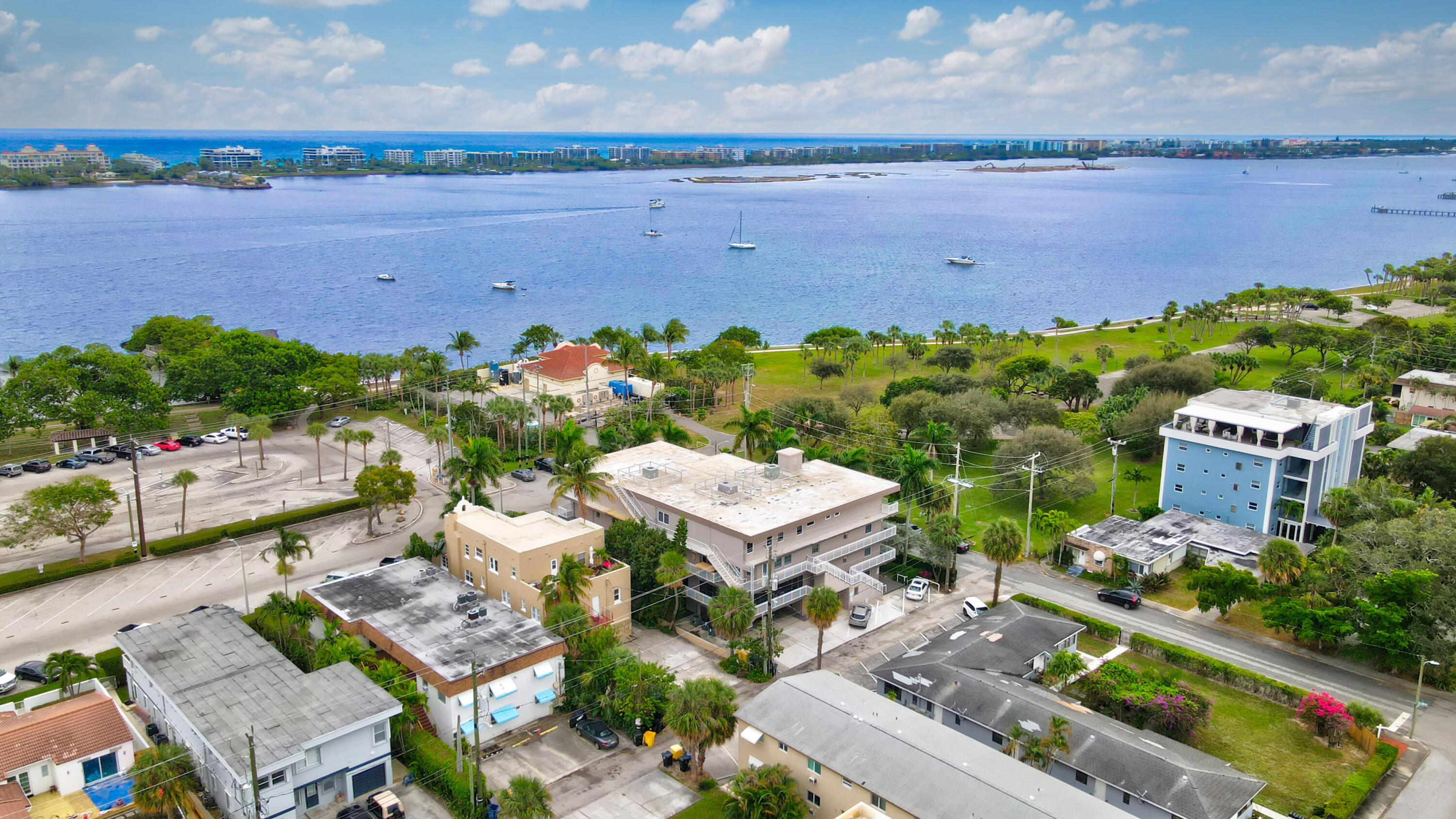 129 South Golfview Road, Unit 2 Lake Worth Beach, FL 33460 - Photo 28 of 35 an aerial view of a house with a garden and lake view