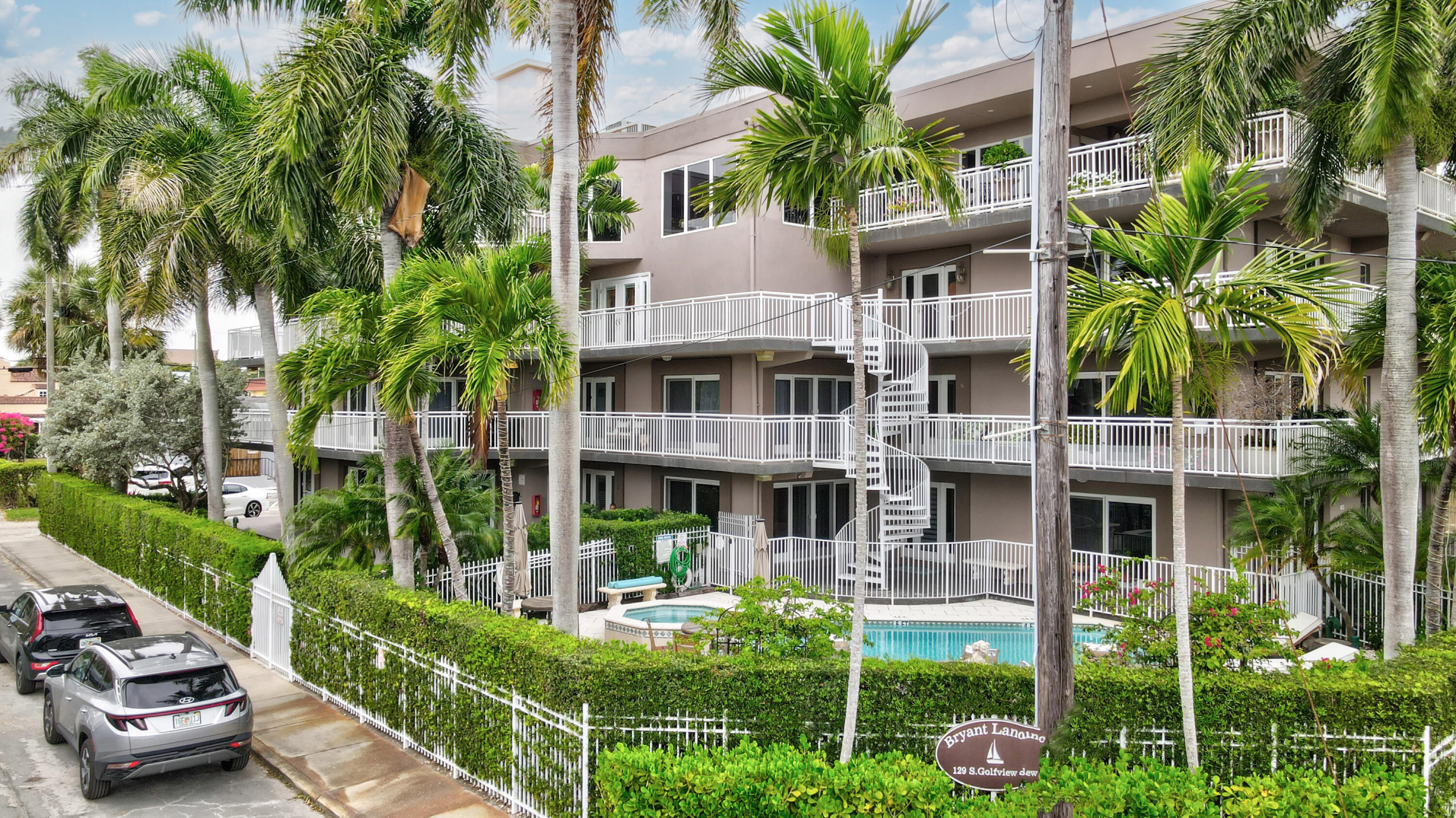 129 South Golfview Road, Unit 2 Lake Worth Beach, FL 33460 - Photo 4 of 35 a front view of multiple houses with yard