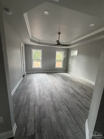 a view of a bathroom with sink and mirror