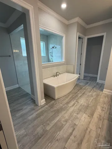 a bathroom with a sink vanity and mirror