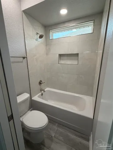 a view of backyard with tree