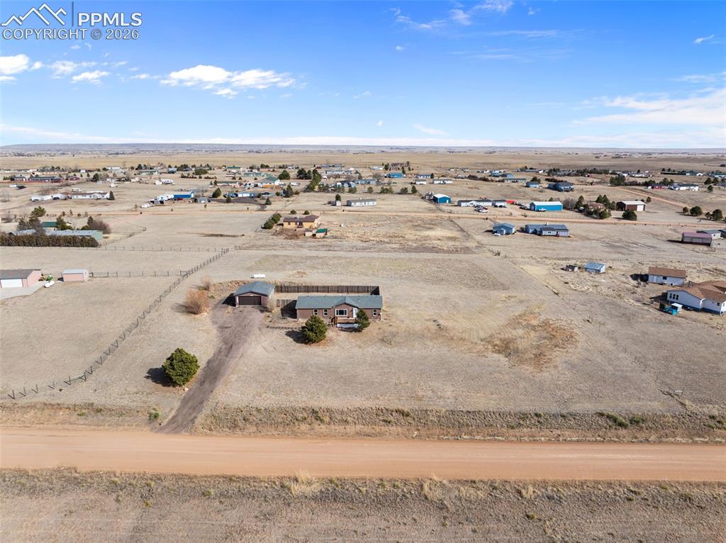 5535 Peerless Farms Road Peyton, CO 80831 - Photo 24 of 27 an aerial view of a city
