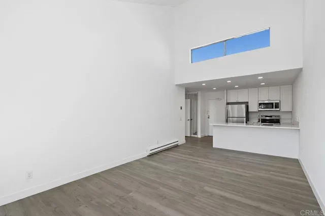 a view of kitchen with wooden floor