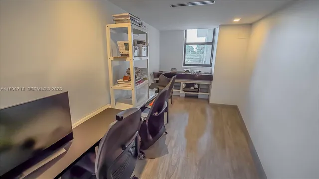 a view of a balcony with furniture