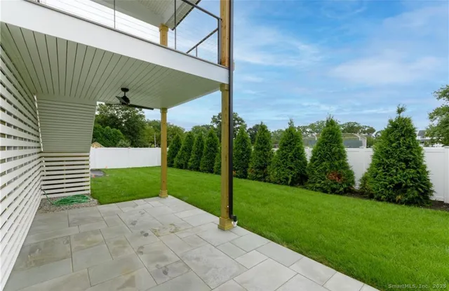 a view of a back yard of the house