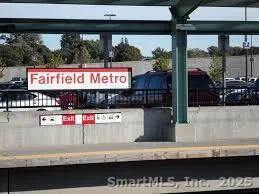 a kitchen with stainless steel appliances kitchen island granite countertop a stove and a microwave