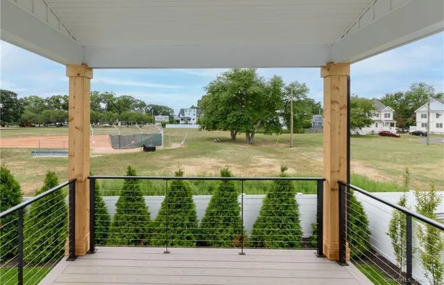 a view of swimming pool from a balcony
