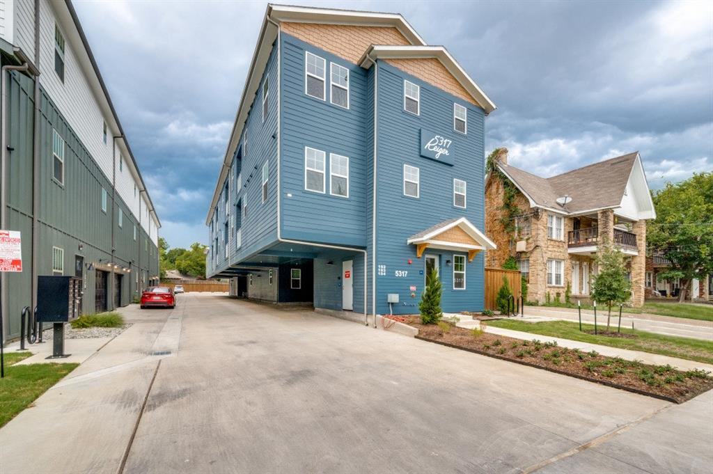 5317 Reiger Avenue, Unit 202 Dallas, TX 75214 - Photo 3 of 12 a view of a building with a street