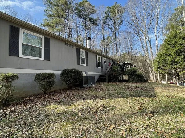 a house view with a backyard space
