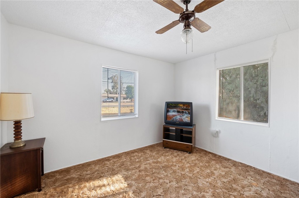 28074 Waterman Road Barstow, CA 92311 - Photo 19 of 25 a view of a livingroom with a workspace