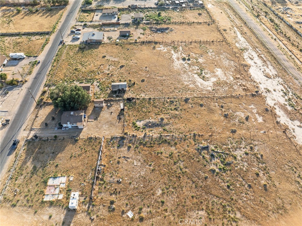 28074 Waterman Road Barstow, CA 92311 - Photo 6 of 25 a view of residential houses with yard