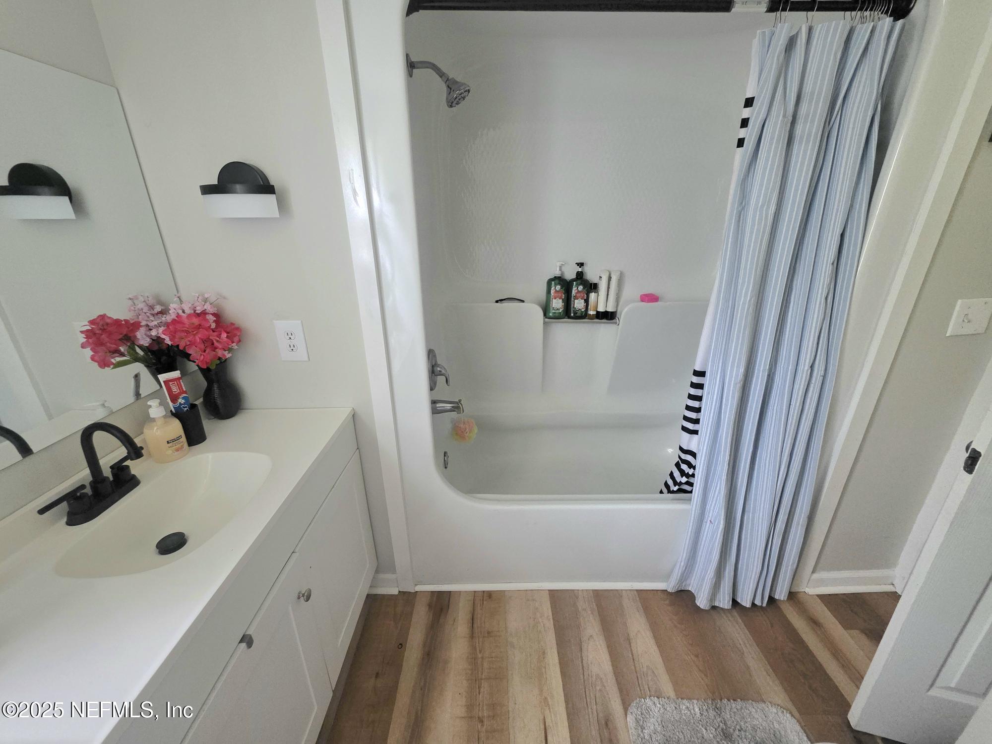 9332 Cedar Road Macclenny, FL 32063 - Photo 15 of 35 a bathroom with a sink and shower