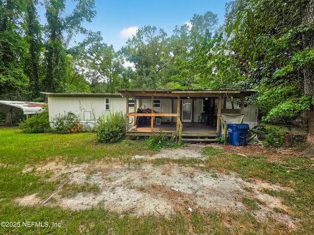 a house view with a garden space