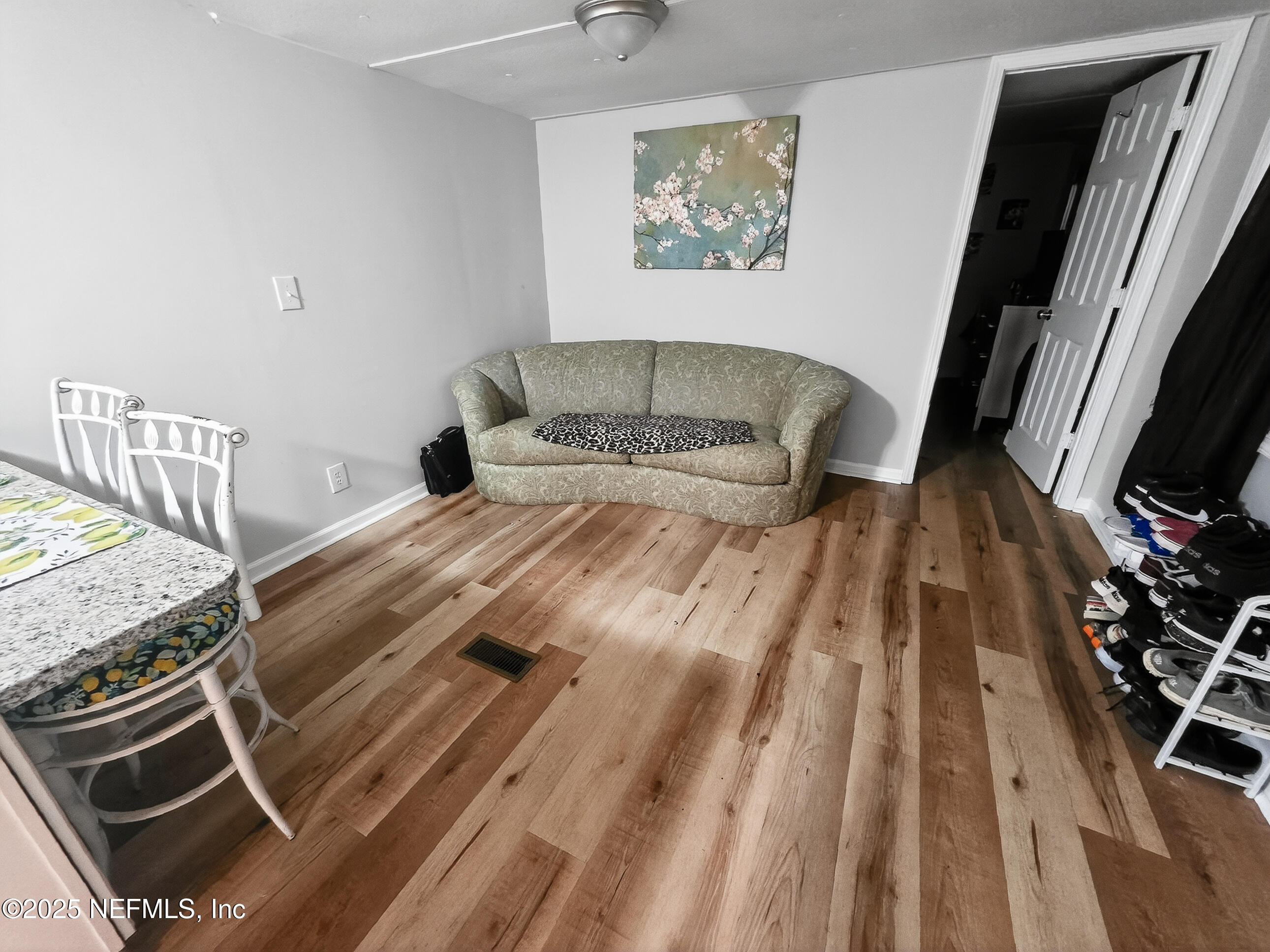 9332 Cedar Road Macclenny, FL 32063 - Photo 5 of 35 a bed sitting in a bedroom next to a window