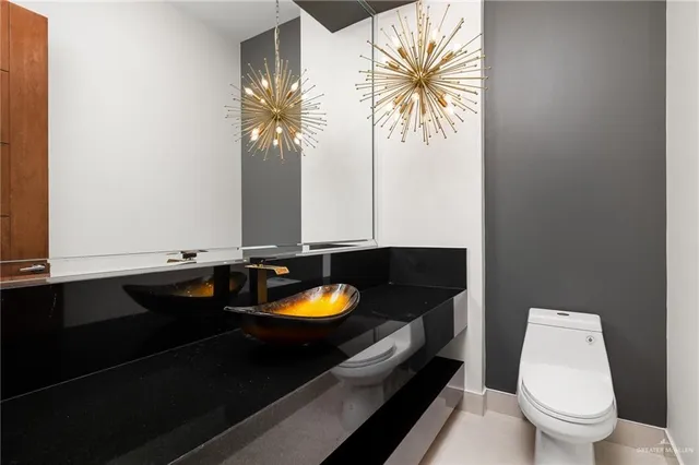 a bathroom with a sink and a toilet