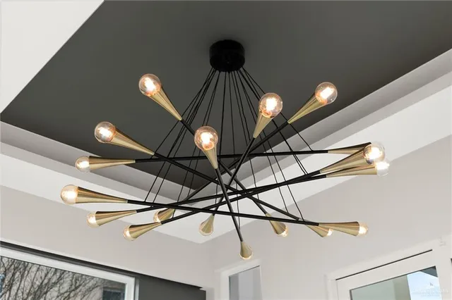 a man sitting on a bench in a hallway