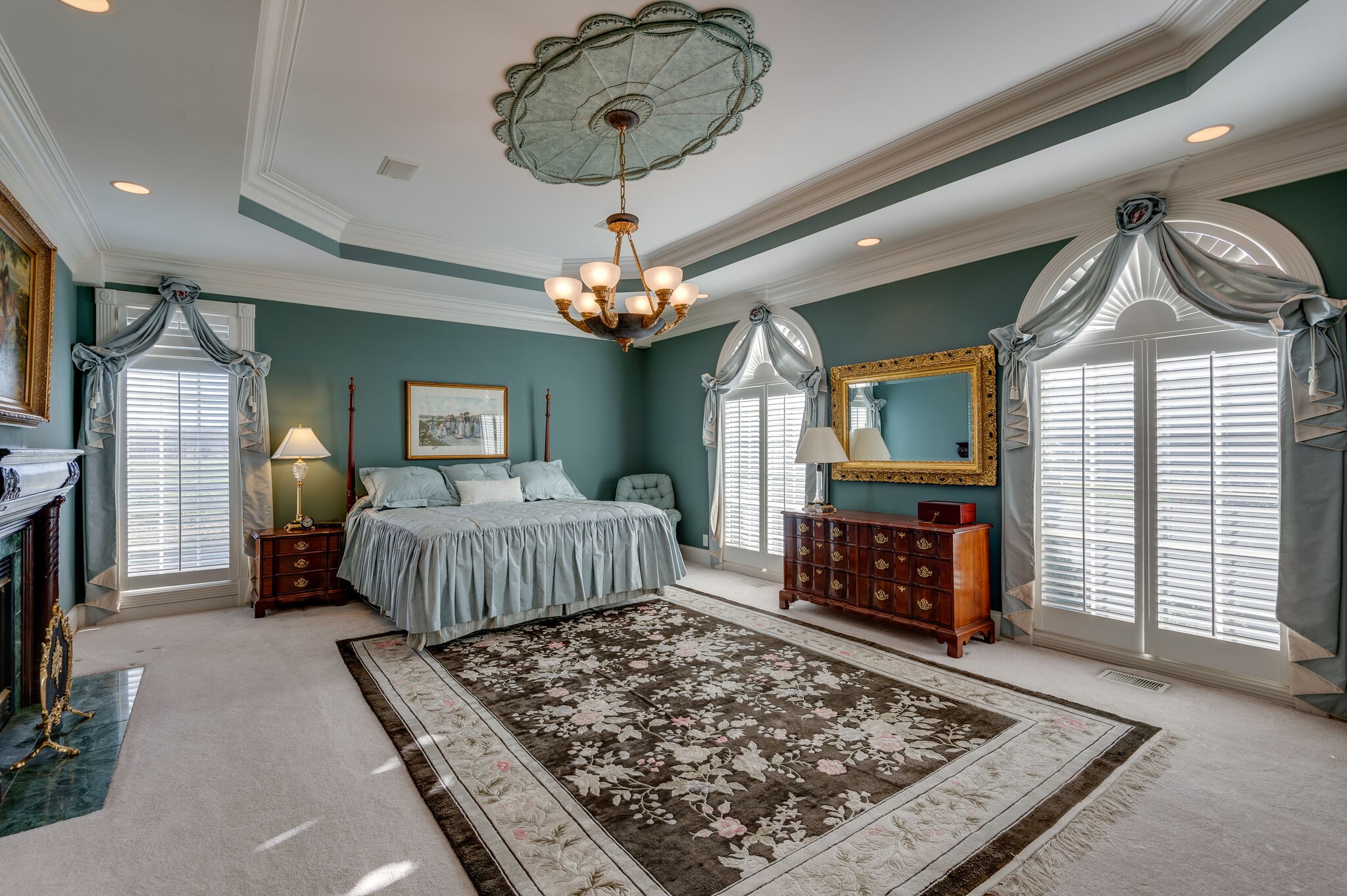 2295 Gideon Road Greenbrier, TN 37073 - Photo 24 of 48 a living room with a couch and chandelier