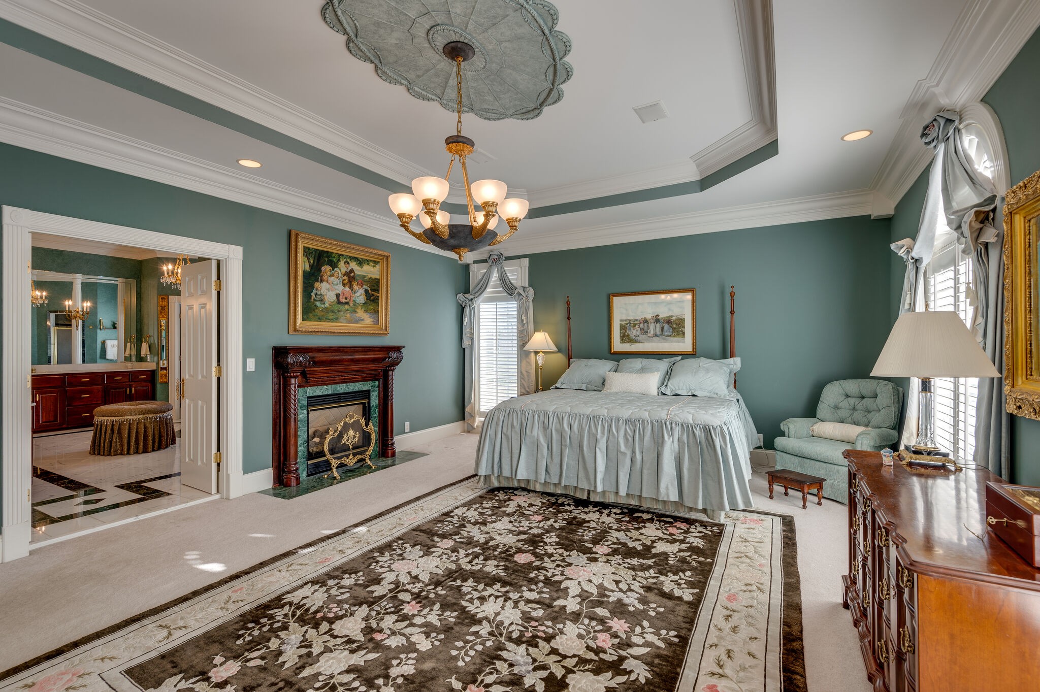 2295 Gideon Road Greenbrier, TN 37073 - Photo 25 of 48 a spacious bedroom with furniture and a chandelier