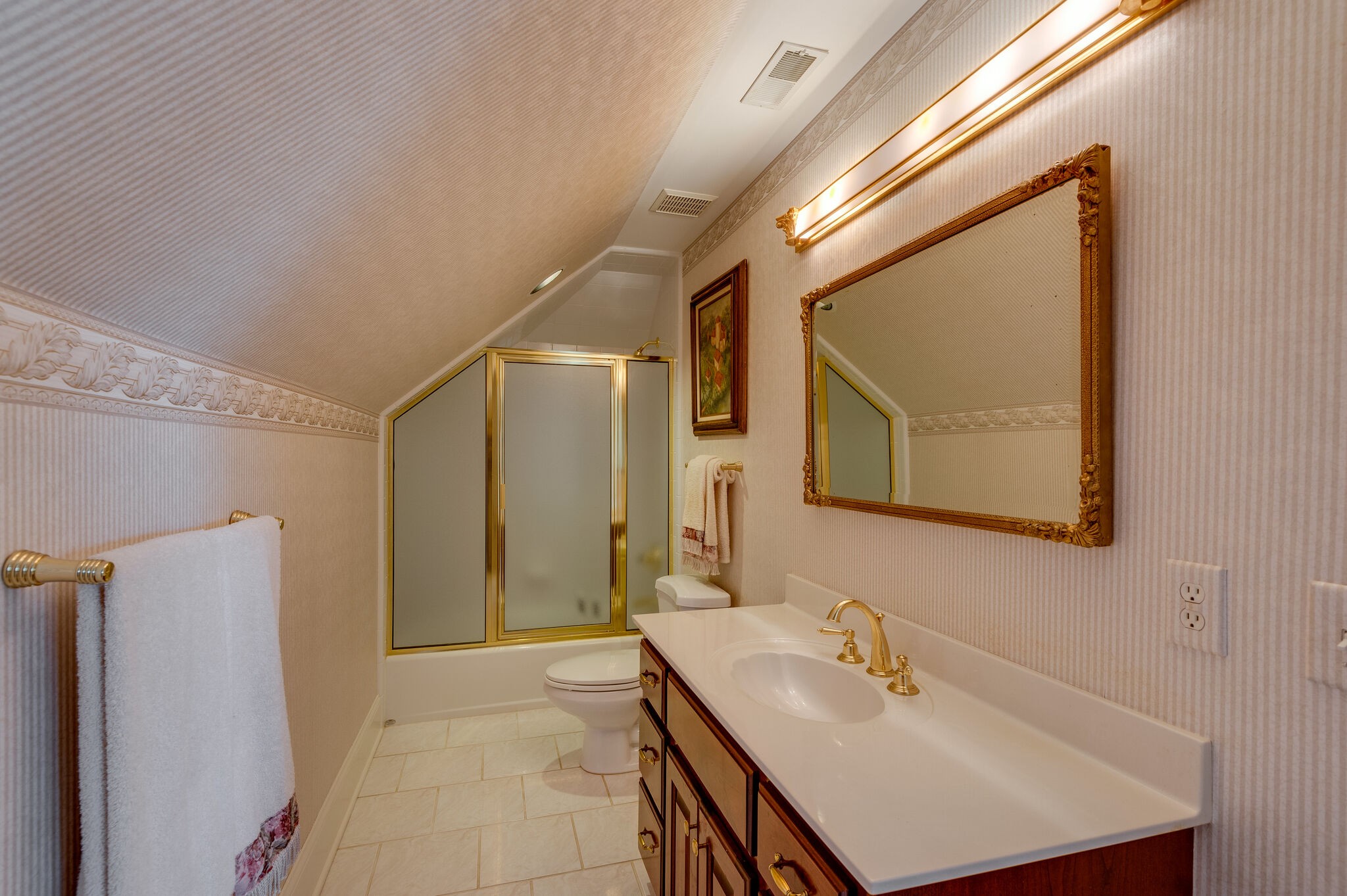 2295 Gideon Road Greenbrier, TN 37073 - Photo 29 of 48 a bathroom with a sink mirror and a shower
