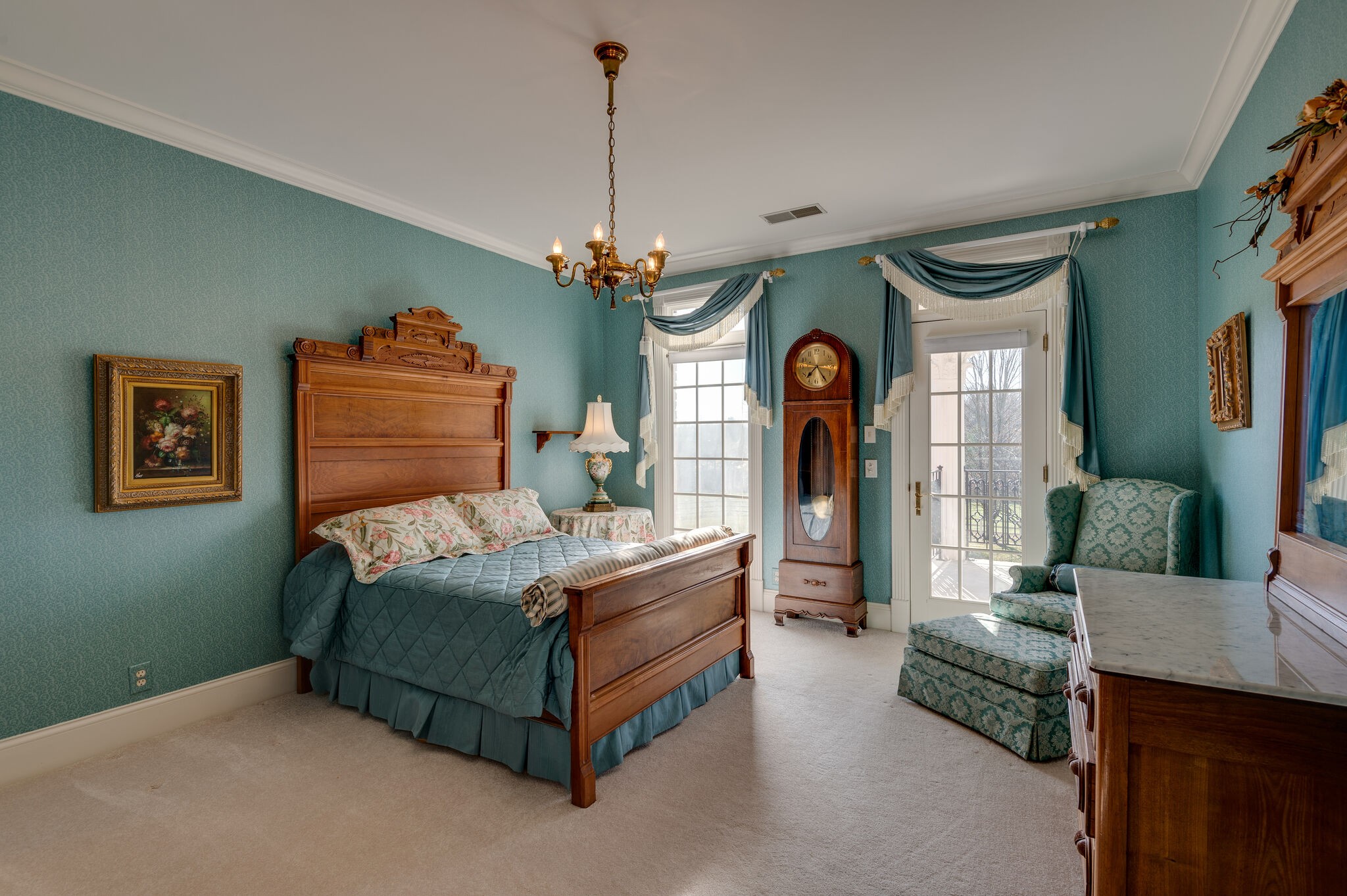 2295 Gideon Road Greenbrier, TN 37073 - Photo 30 of 48 a bedroom with bed and a chandelier