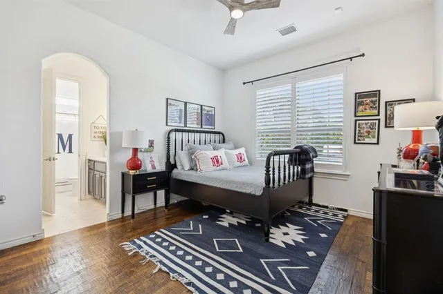 a bathroom with a sink a mirror and a light fixture