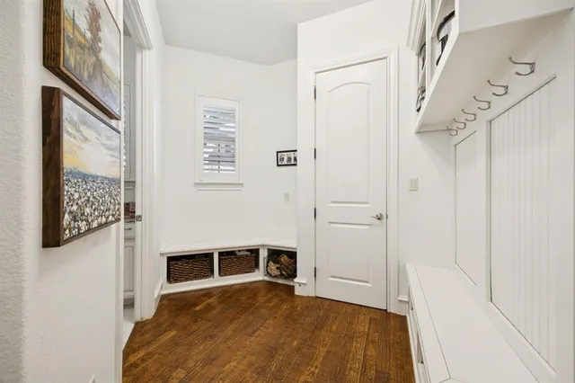 a kitchen with granite countertop cabinets and window