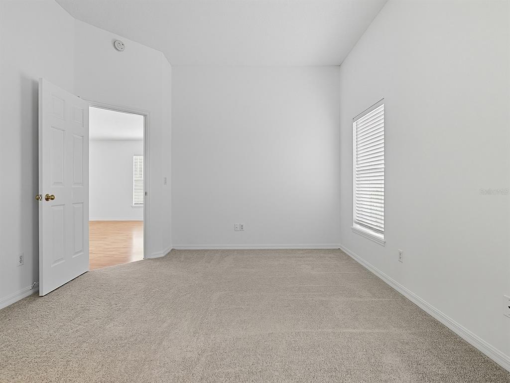 3016 Andover Court Mount Dora, FL 32757 - Photo 46 of 71 an empty room with windows