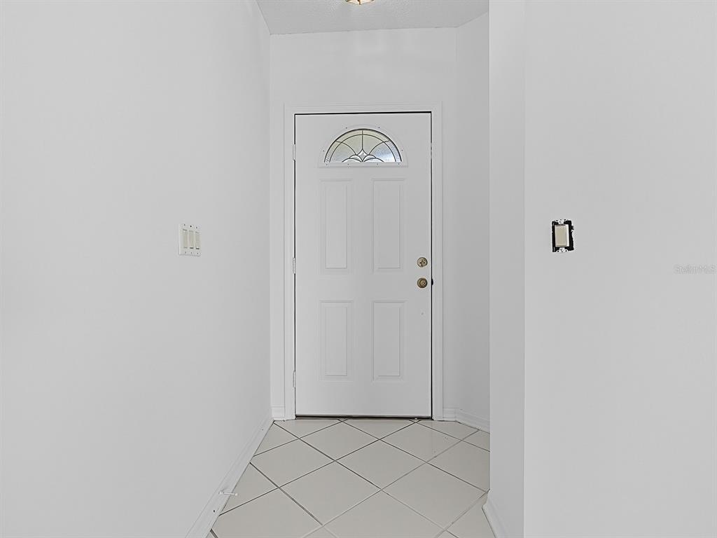 3016 Andover Court Mount Dora, FL 32757 - Photo 57 of 71 a view of a hallway with closet