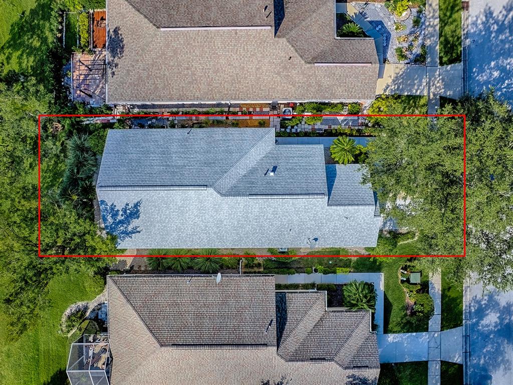 3016 Andover Court Mount Dora, FL 32757 - Photo 64 of 71 an aerial view of a house with a yard
