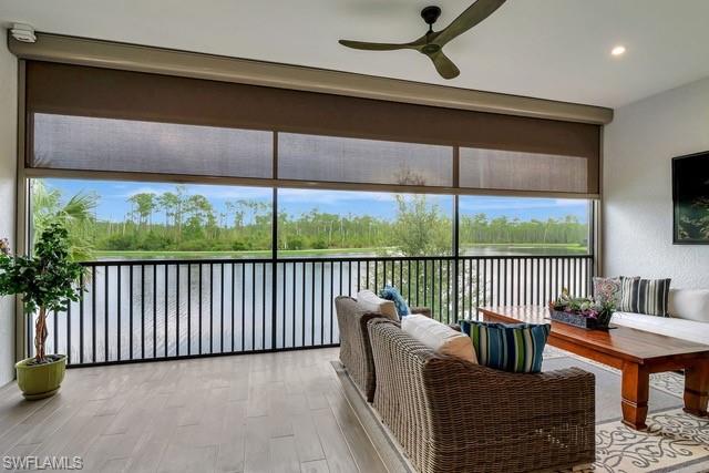 9637 Montelanico Loop, Unit 203 Naples, FL 34119 - Photo 17 of 50 Stunning View of lake and preserves with remote sunshade