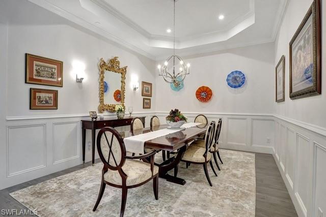 9637 Montelanico Loop, Unit 203 Naples, FL 34119 - Photo 9 of 50 CURRENT dining/flex room with custom wainscoting walls.