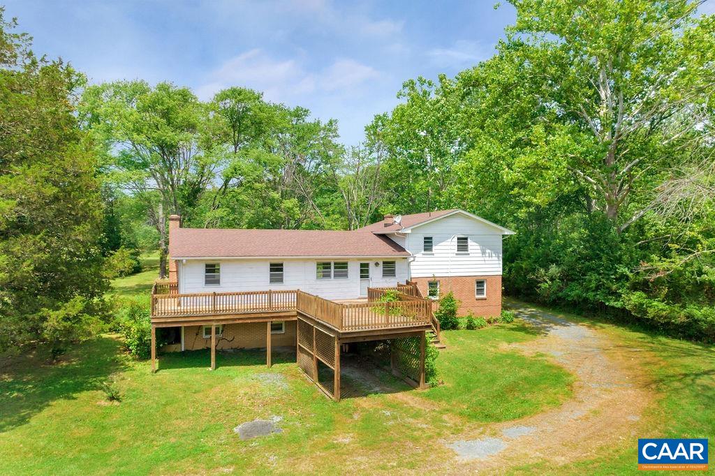 3605 Keswick Road Keswick, VA 22947 - Photo 2 of 35 a aerial view of a house with a yard table and chairs