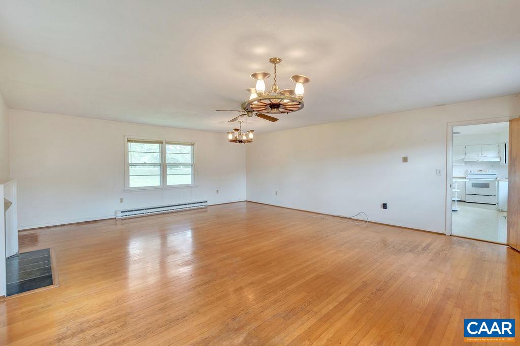 3605 Keswick Road Keswick, VA 22947 - Photo 24 of 35 wooden floor in an empty room with a window