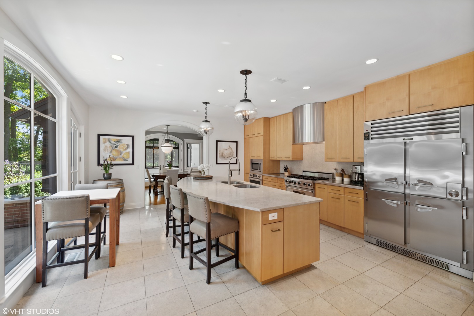 520 Forest Cove Road Lake Bluff, IL 60044 - Photo 13 of 48 a large kitchen with lots of furniture a sink appliances and dining table