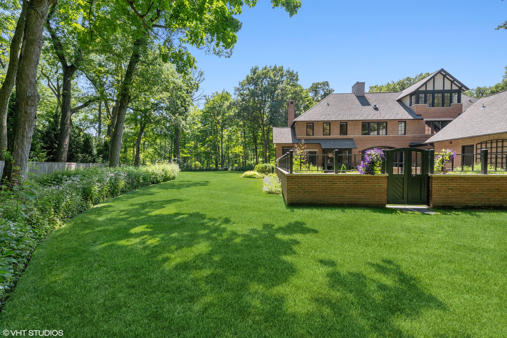 520 Forest Cove Road Lake Bluff, IL 60044 - Photo 36 of 48 a front view of a house with garden