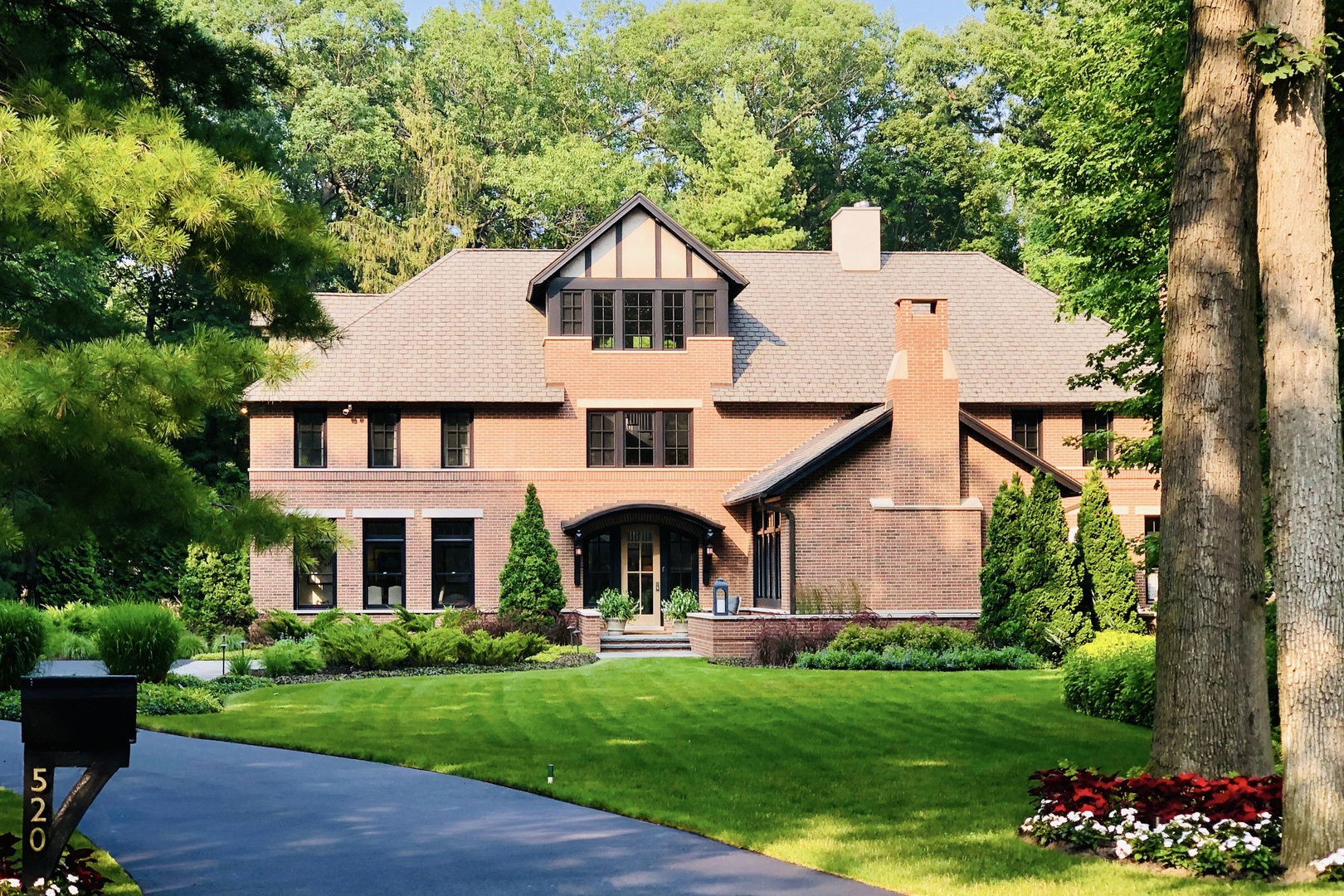 520 Forest Cove Road Lake Bluff, IL 60044 - Photo 42 of 48 a front view of a house with a garden