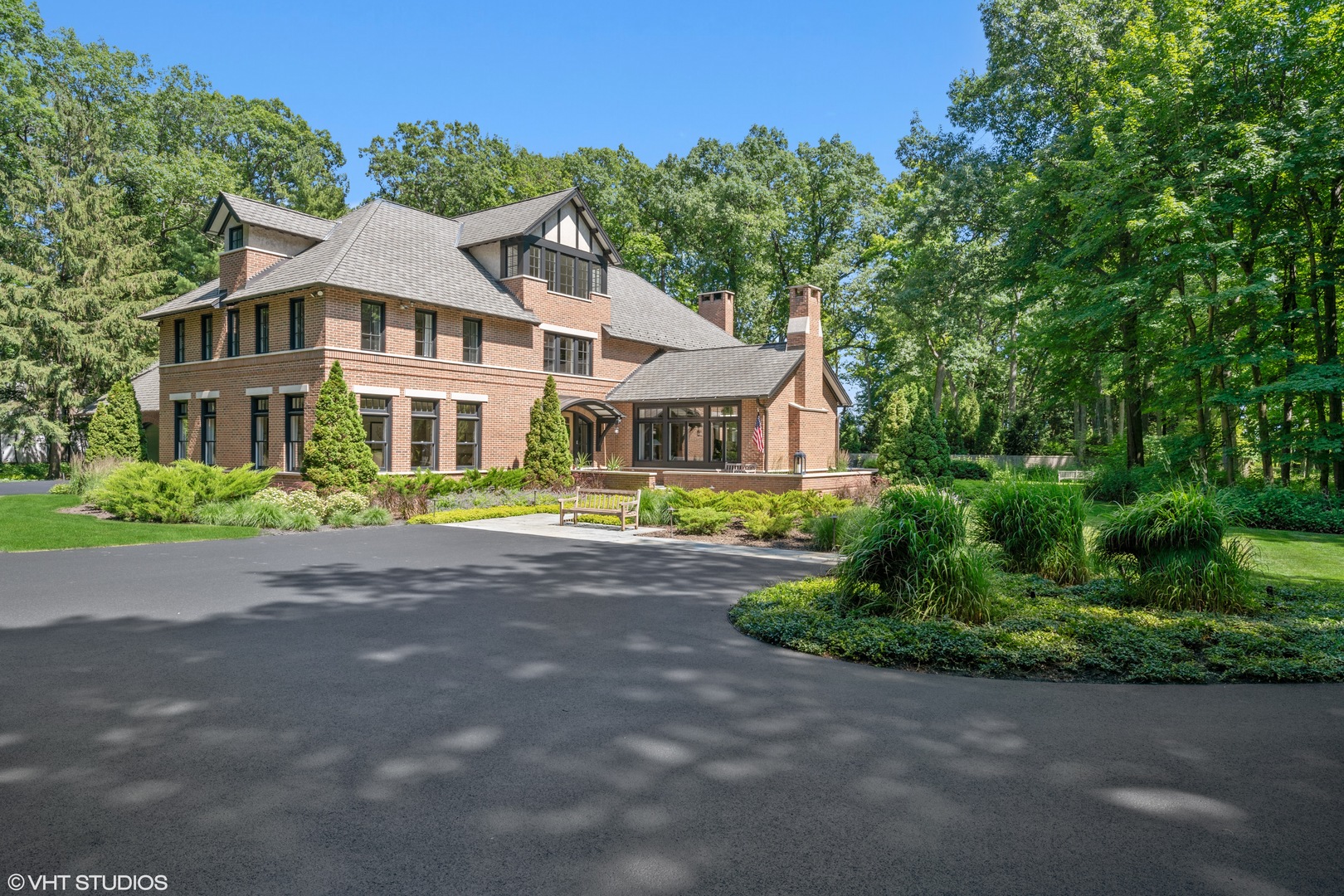520 Forest Cove Road Lake Bluff, IL 60044 - Photo 43 of 48 a view of a white house with a big yard and large trees