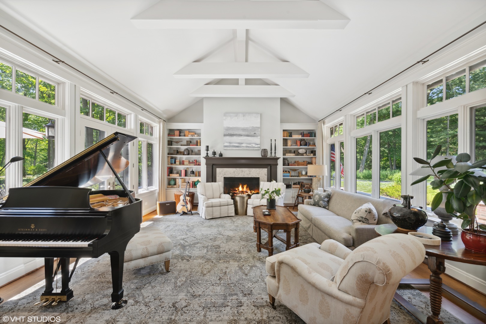 520 Forest Cove Road Lake Bluff, IL 60044 - Photo 5 of 48 a living room with furniture a fireplace and a large window